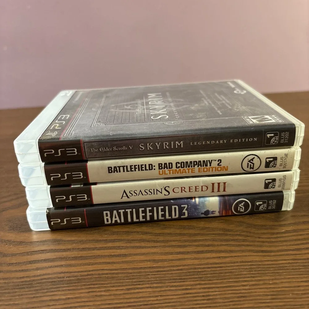 Sony PS3 Video Game Lot 4 Skyrim Battlefield 3 Bad Company 2 Assassins Creed III